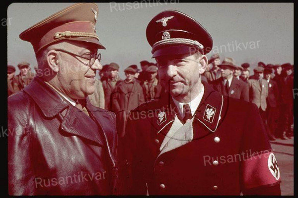 AllDay.ru_192a Hitler's personal physician Morell (L) and Reichs Press Chie.jpg