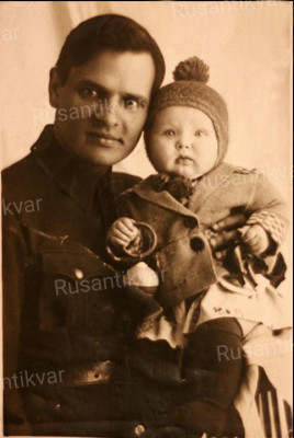 Николай Михайлин с дочкой.jpg