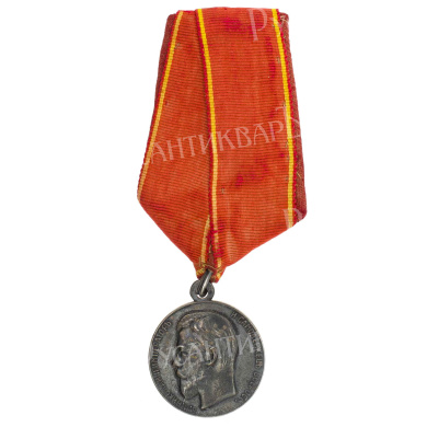 Медаль "За Усердие" с портретом Императора Николая II (образца 1895 г) на колодке с лентой ордена Св. Анны (для сестёр милосердия. Серебро.